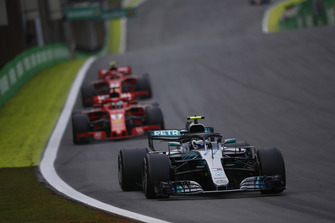 Valtteri Bottas, Mercedes AMG F1 W09 EQ Power+, leads Kimi Raikkonen, Ferrari SF71H, and Sebastian Vettel, Ferrari SF71H