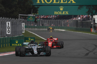 Valtteri Bottas, Mercedes AMG F1 W09 EQ Power+ and Kimi Raikkonen, Ferrari SF71H