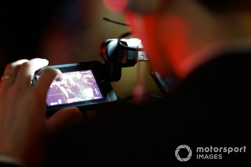 A video camera on the red carpet