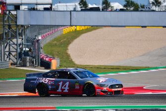 Kevin Magnussen, Haas F1 Team, and Romain Grosjean, Haas F1 Team, take it in turns to ride in a NASCAR with Tony Stewart