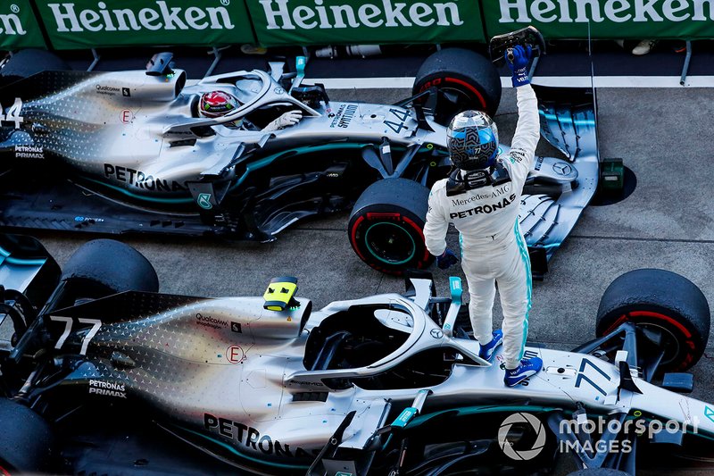 Valtteri Bottas, Mercedes AMG W10, 1st position, and Lewis Hamilton, Mercedes AMG F1 W10, 3rd position, arrive in Parc Ferme