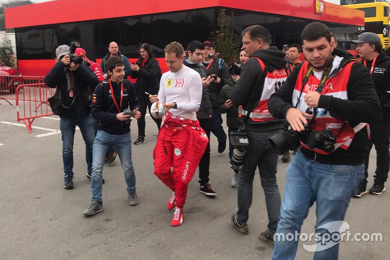 Sebastian Vettel, Ferrari signs autographs for the fans