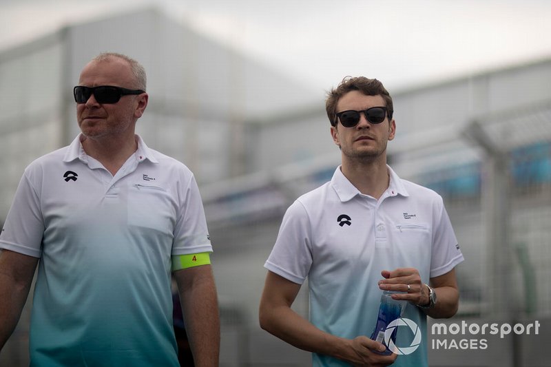 Tom Dillmann, NIO Formula E Team, walks the track with a team member