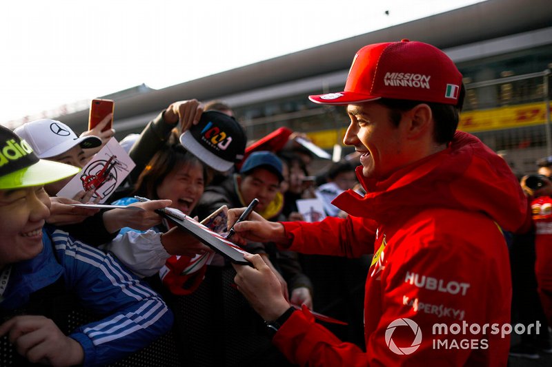 Charles Leclerc, Ferrari signs an autograph for a fan