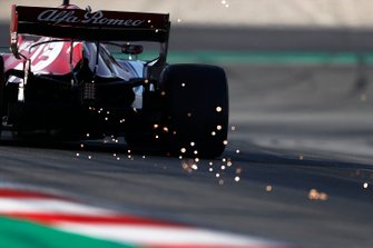 Kimi Raikkonen, Alfa Romeo Racing C38 throws up the sparks