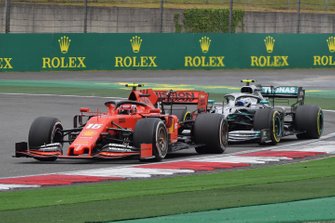 Charles Leclerc, Ferrari SF90, leads Valtteri Bottas, Mercedes AMG W10