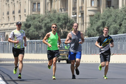 Jenson Button, McLaren runs the circuit with Mike Collier, Personal Trainer and Stoffel Vandoorne, McLaren Test and Reserve Driver
