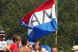Fans and a flag for Max Verstappen, Red Bull Racing