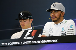 Lewis Hamilton, Mercedes AMG F1 with team mate Nico Rosberg, Mercedes AMG F1 in the FIA Press Confer