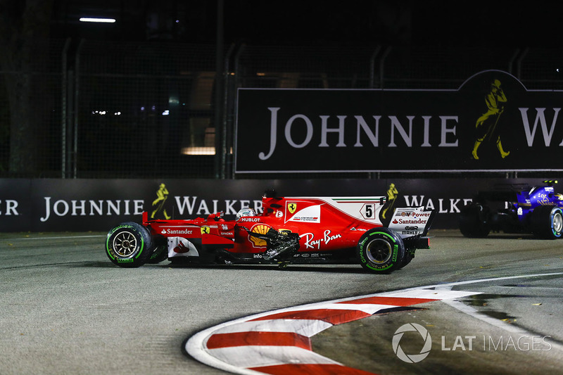 The damaged car of Sebastian Vettel, Ferrari SF70H