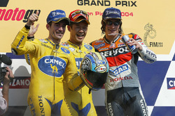 Podium: race winner Makoto Tamada, Honda, second place Max Biaggi, Honda, third place Nicky Hayden, Repsol Honda Team