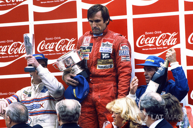 Podium: winnaar Carlos Reutemann, Williams, tweede Jacques Laffite, Talbot Ligier Matra, derde Nigel