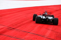 Romain Grosjean, Haas F1 Team VF-17 runs wide