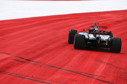 Romain Grosjean, Haas F1 Team VF-17 runs wide