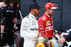 Polesitter Lewis Hamilton, Mercedes AMG F1, title rival Sebastian Vettel, Ferrari