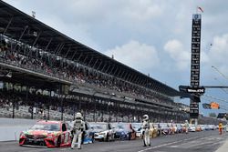 Kyle Busch, Joe Gibbs Racing Toyota, the field parked on pit road for a rain delay