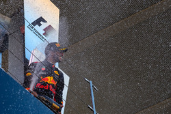 Daniel Ricciardo, Red Bull Racing celebrates on the podium with the champagne