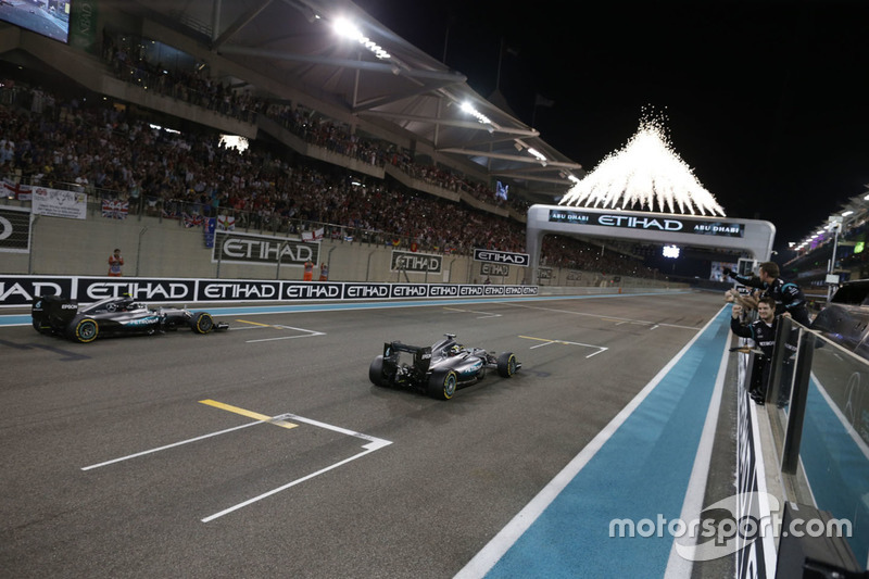 Race winner Lewis Hamilton, Mercedes AMG F1 W07 Hybrid crosses the finish line at the end of the race with second place World Champion Nico Rosberg, Mercedes AMG F1 W07 Hybrid