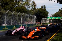 Fernando Alonso, McLaren MCL32, leads Esteban Ocon, Force India VJM10