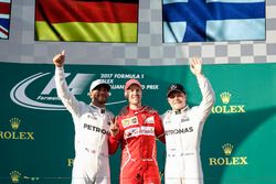 Lewis Hamilton, Mercedes AMG, 2nd Position, Sebastian Vettel, Ferrari, 1st Position, and Valtteri Bottas, Mercedes AMG, 3rd Position, on the podium