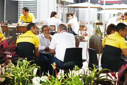 Cyril Abiteboul, Managing Director, Renault Sport F1 Team, Alain Prost and Helmut Markko, Consultant, Red Bull Racing, in the paddock