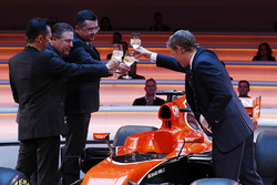 Yusuke Hasegawa, Senior Managing Officer, Honda, Zak Brown, Executive Director of McLaren Technology Group, Eric Boullier, Racing Director, McLaren, and presenter Simon Lazenby toast the McLaren MCL32