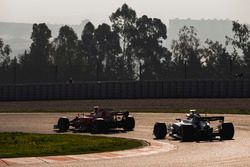 Sebastian Vettel, Ferrari SF70H, leads Valtteri Bottas, Mercedes AMG F1 W08