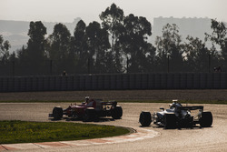 Sebastian Vettel, Ferrari SF70H, leads Valtteri Bottas, Mercedes AMG F1 W08
