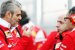 Maurizio Arrivabene, Team Principal, Ferrari, talks to colleagues