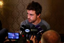 Fernando Alonso talks to the media after announcing his deal to race in the 2017 Indianapolis 500 in