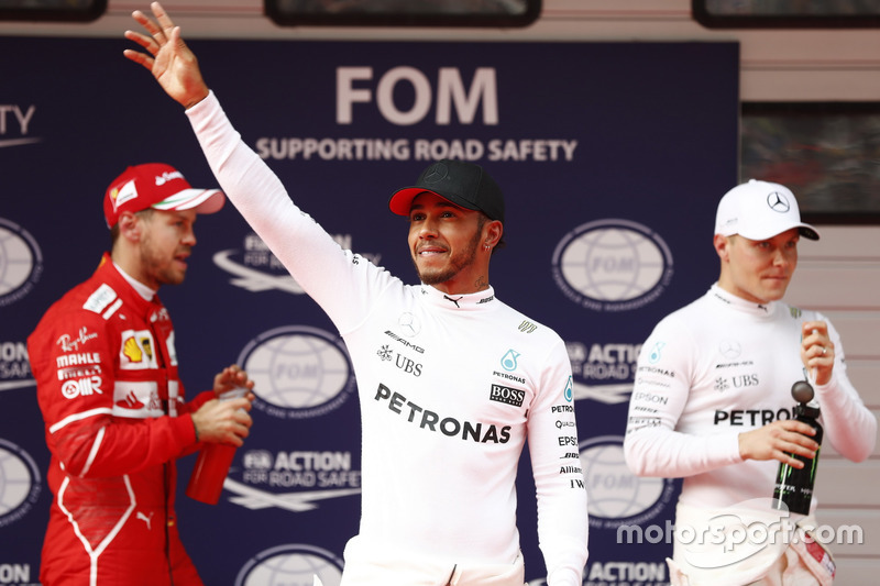 Top three qualifiers Lewis Hamilton, Mercedes AMG, Sebastian Vettel, Ferrari, and Valtteri Bottas, M