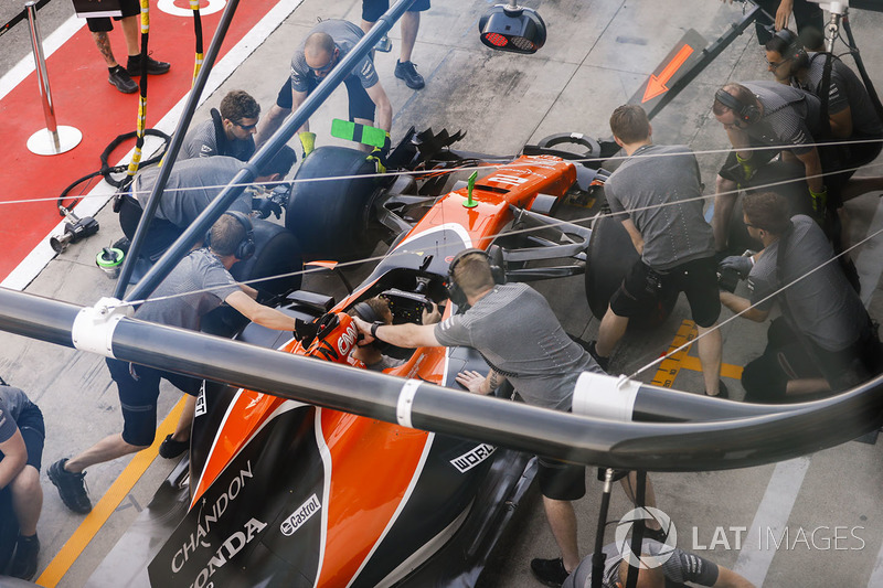 The McLaren team practice pit stops