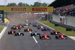 Sebastian Vettel, Ferrari SF70-H leads Kimi Raikkonen, Ferrari SF70-H at the start of the race