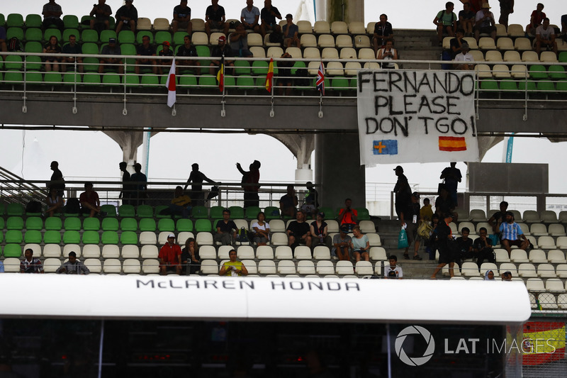 Supporters of Fernando Alonso, McLaren MCL32, display a banner in a grandstand