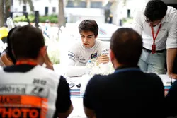 Lance Stroll, Williams, talks to the media