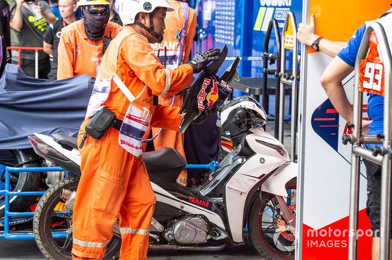 Marc Marquez, Repsol Honda Team, crashed bike covered up