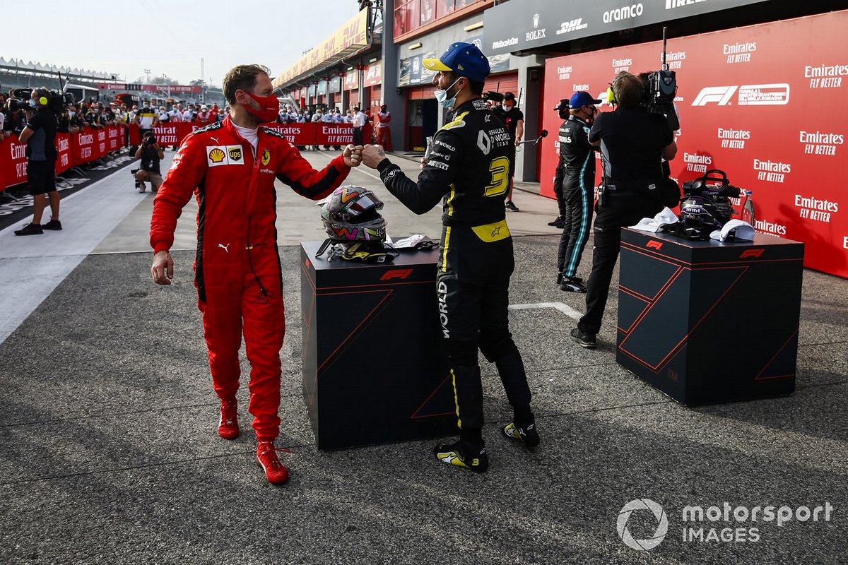 Sebastian Vettel, Ferrari, congratulates Daniel Ricciardo, Renault F1, 3rd position, in Parc Ferme