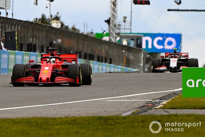 Sebastian Vettel, Ferrari SF1000, Kevin Magnussen, Haas VF-20 