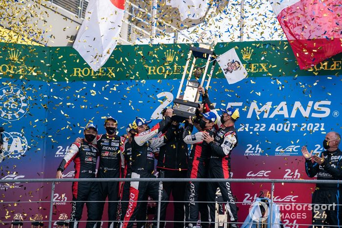#7 Toyota Gazoo Racing Toyota GR010 - Hybrid Hypercar, Mike Conway, Kamui Kobayashi, Jose Maria Lopez and #8 Toyota Gazoo Racing Toyota GR010 - Hybrid Hypercar, Sebastien Buemi, Kazuki Nakajima, Brendon Hartley celebrate podium
