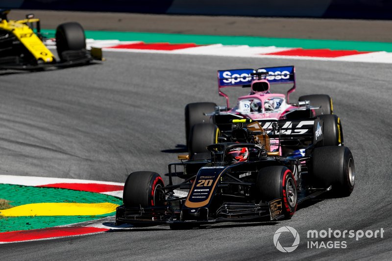 Kevin Magnussen, Haas F1 Team VF-19 leads Sergio Perez, Racing Point RP19 and Nico Hulkenberg, Renault F1 Team R.S. 19