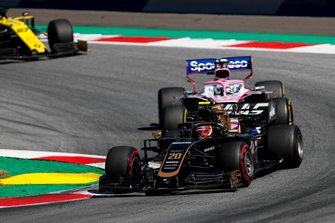 Kevin Magnussen, Haas F1 Team VF-19 leads Sergio Perez, Racing Point RP19 and Nico Hulkenberg, Renault F1 Team R.S. 19