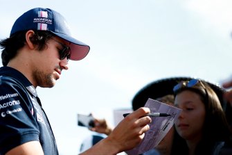 Lance Stroll, Racing Point signs a autograph for a fan
