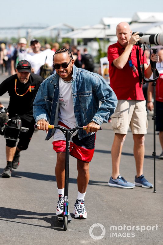 Lewis Hamilton, Mercedes AMG F1 on a scooter in the paddock