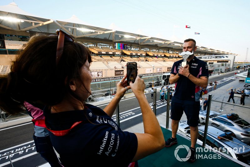 A Movember prize is awarded to a Racing Point team member