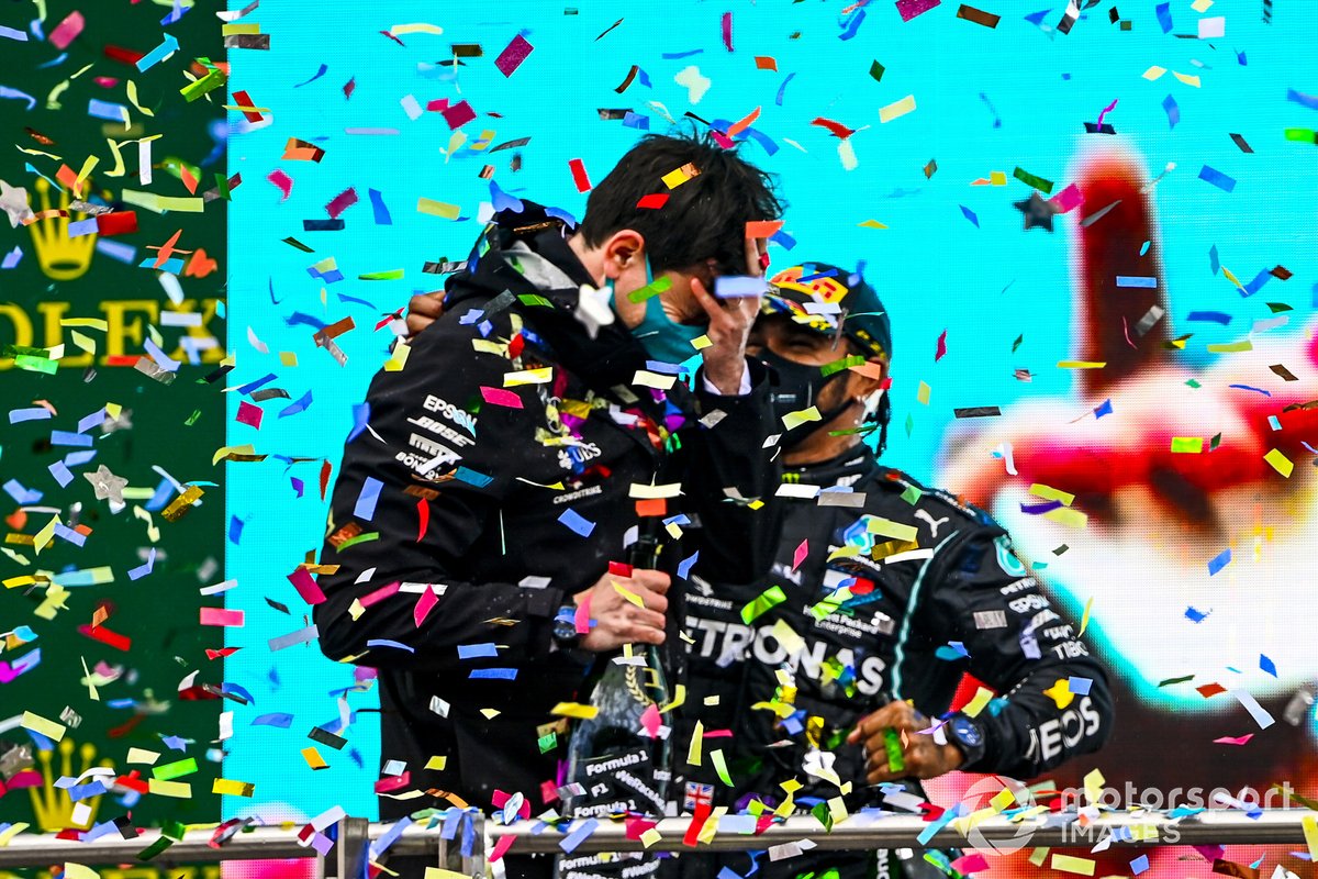 Toto Wolff, Executive Director (Business), Mercedes AMG, and Lewis Hamilton, Mercedes-AMG F1, 1st position, celebrate on the podium