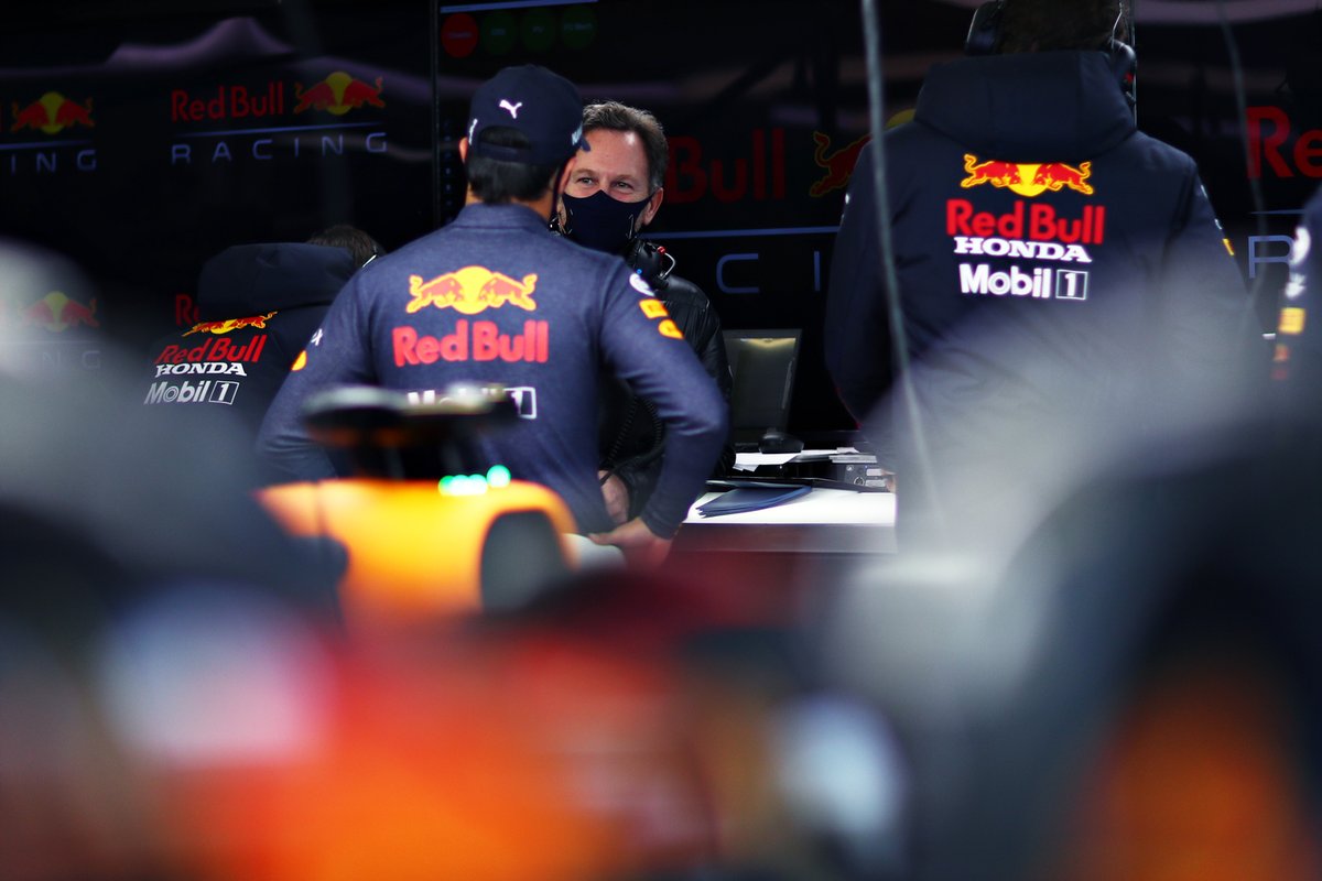 Sergio Perez, Red Bull Racing talks to the Team Principal Christian Horner