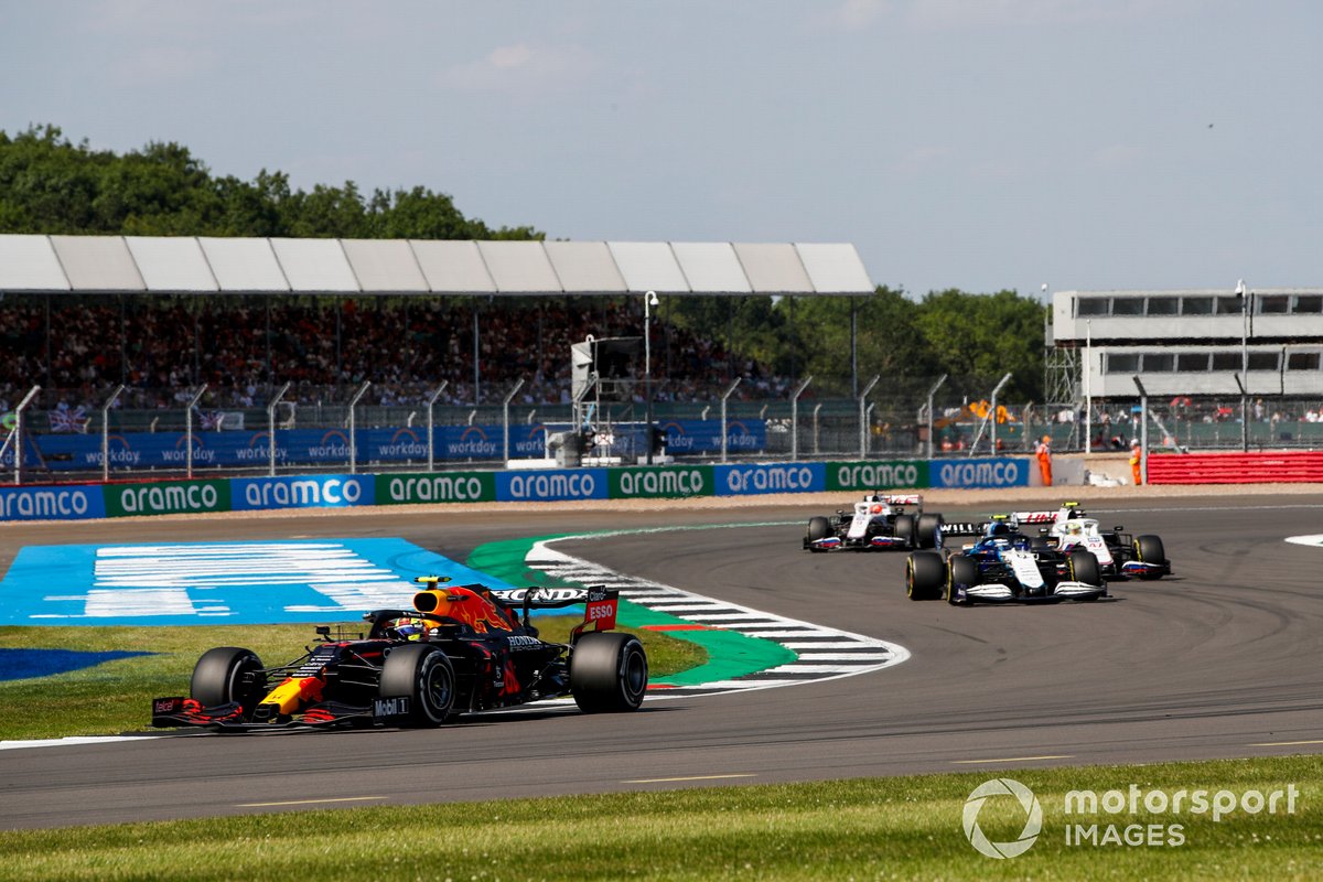 Sergio Perez, Red Bull Racing RB16B, Nicholas Latifi, Williams FW43B, and Mick Schumacher, Haas VF-21