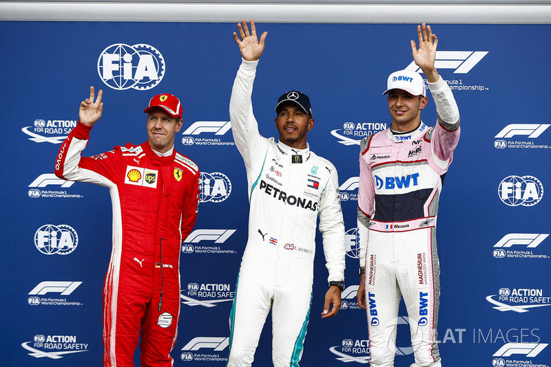 Sebastian Vettel, Ferrari, with Esteban Ocon, Racing Point Force India VJM1, Lewis Hamilton, Mercedes AMG F1