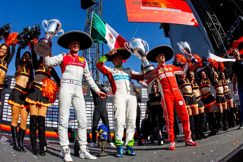 Winner Benito Guerra celebrates on the podium with runner up Loic Duval and ROC Skills Challenge winner Sebastian Vettel