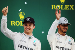 The podium (L to R): second placed Nico Rosberg, Mercedes AMG F1 with team mate and race winner Lewi